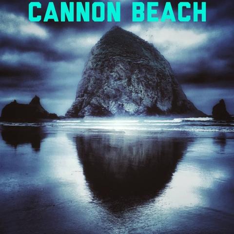 cannon beach oregon high contrast beach pic with giant rock