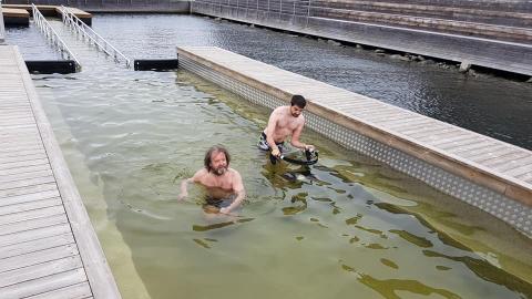 2 men swimming in Marinex Swimming Rig