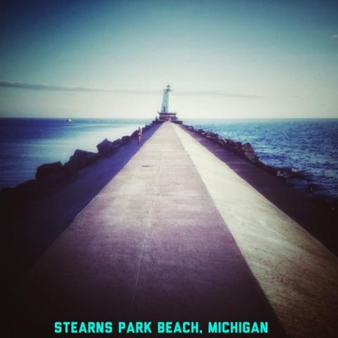 stearns park beach and light in distance at end of accessible walkway